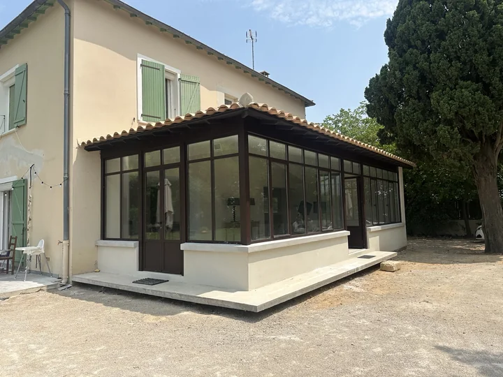 Véranda sur maison ancienne